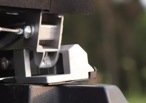 Patented rear push down latch system.